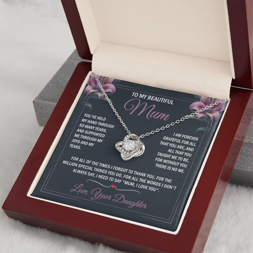 mum wearing knot necklace gift from daughter son