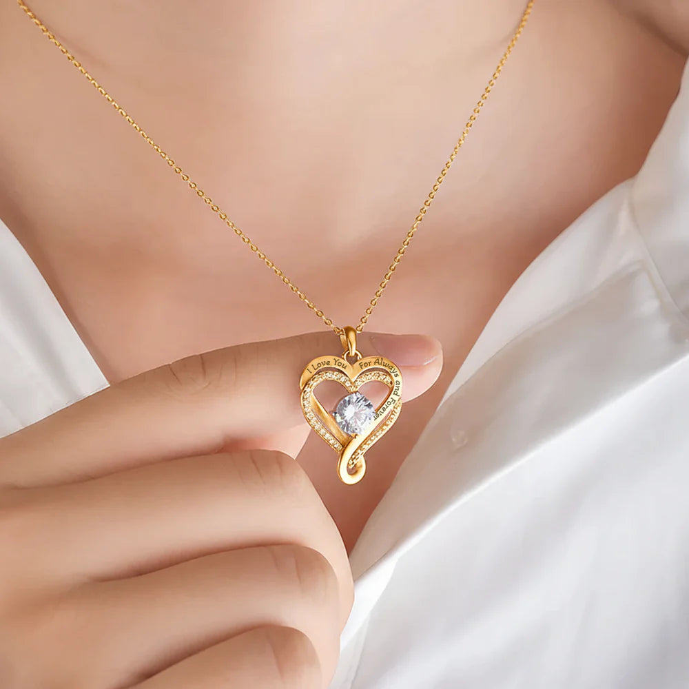woman wearing interlocked hearts necklace jewelry