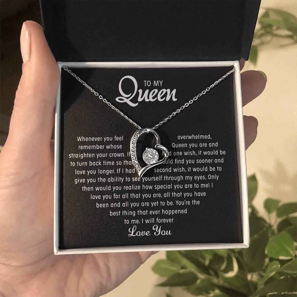 woman wearing queen heart necklace jewelry